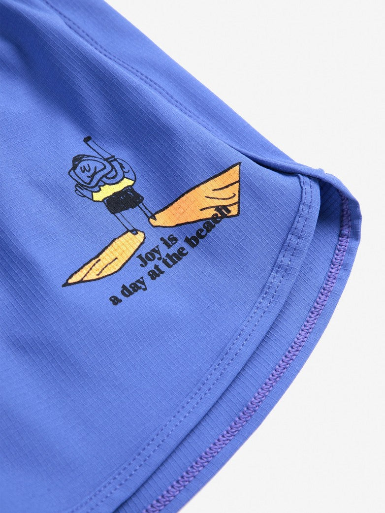A Day At The Beach Swim Trunks